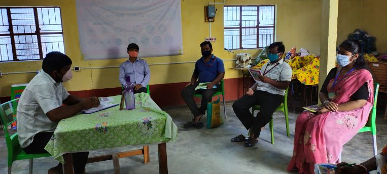 Staff meeting to help unemployed brick kiln workers during COVID-19 pandemic crisis